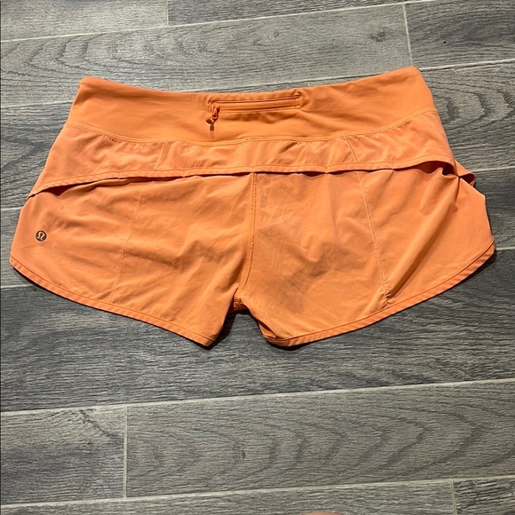 lululemon Speed Up Orange Shorts - Picture 3 of 10